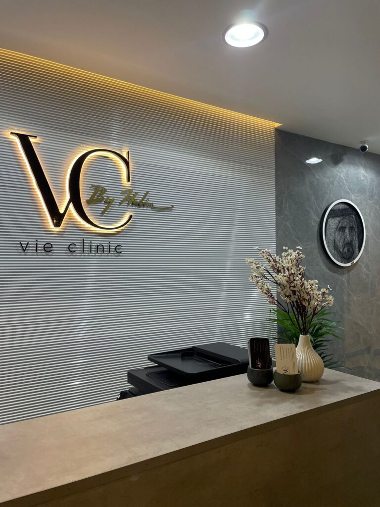 Vie Clinic by Halim interior front desk and logo